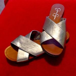 Jessica Simpson silver w/ rhinestone around soles.
